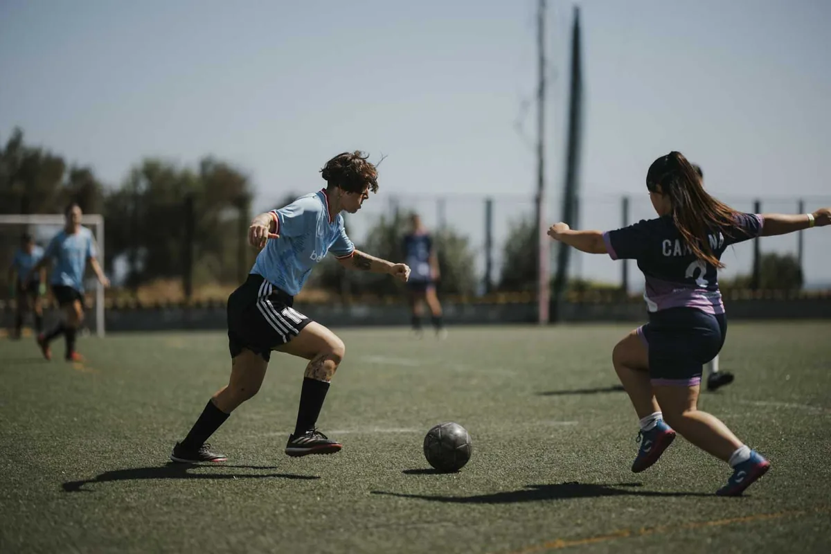 Players in light blue and purple compete in the 2026 women’s Champions Cup