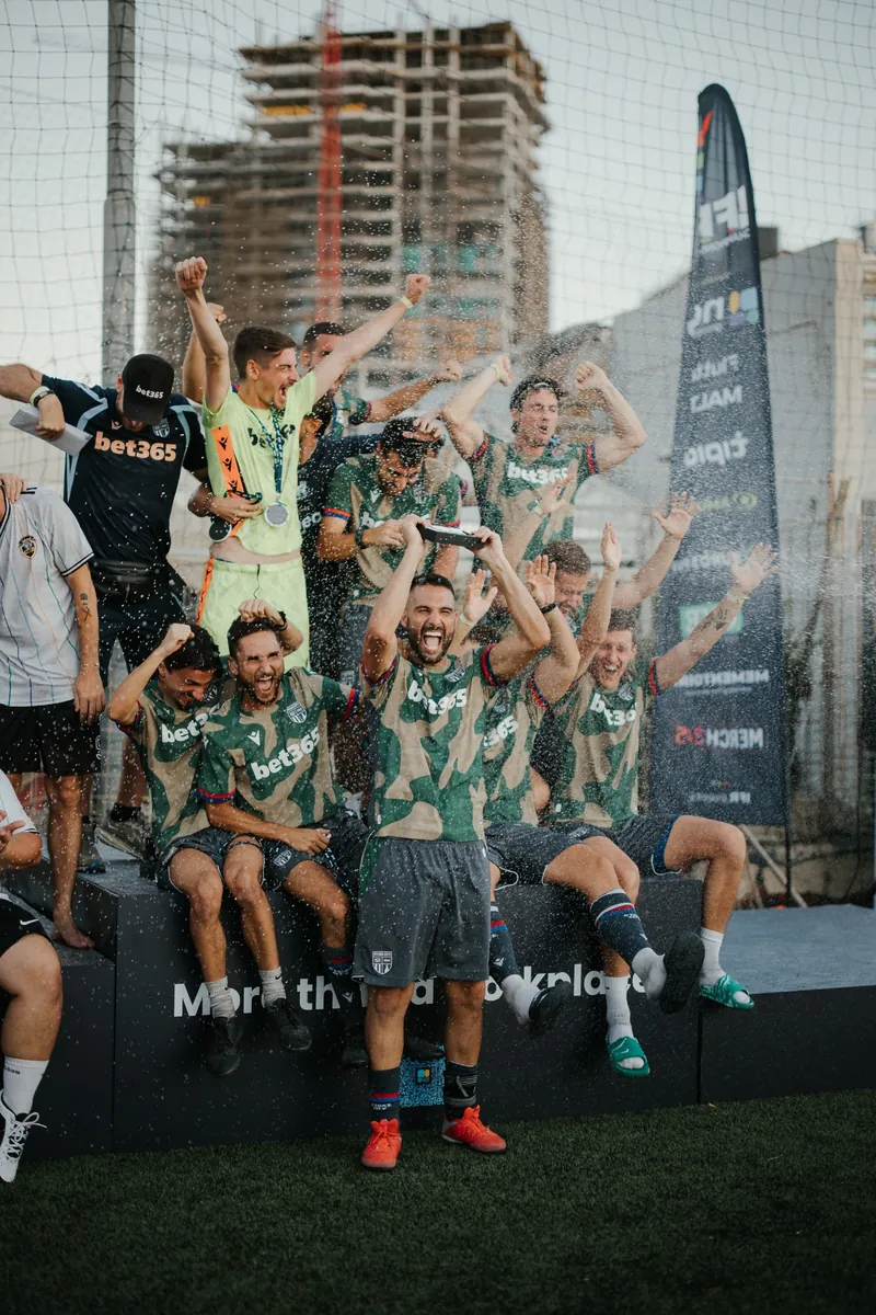 Men’s team celebrating on the podium at the 2026 IFR Champions Cup