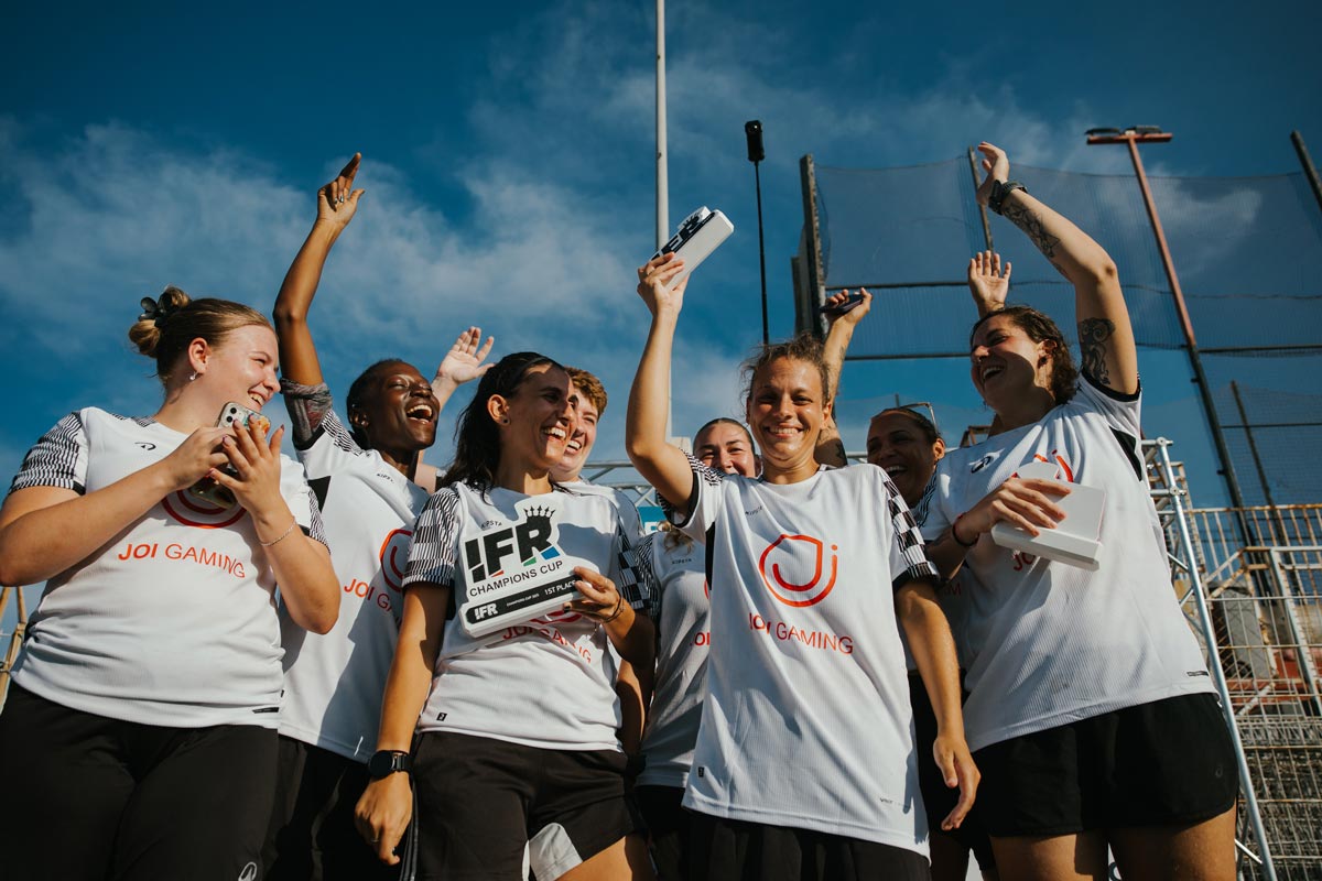 JOI Gaming women celebrating with their IFR Champions Cup trophy