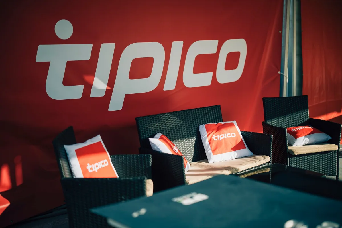Tipico’s branded hospitality seating beside the IFR Padel Cup courts